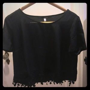 Black blouse with lace bottom and tassels